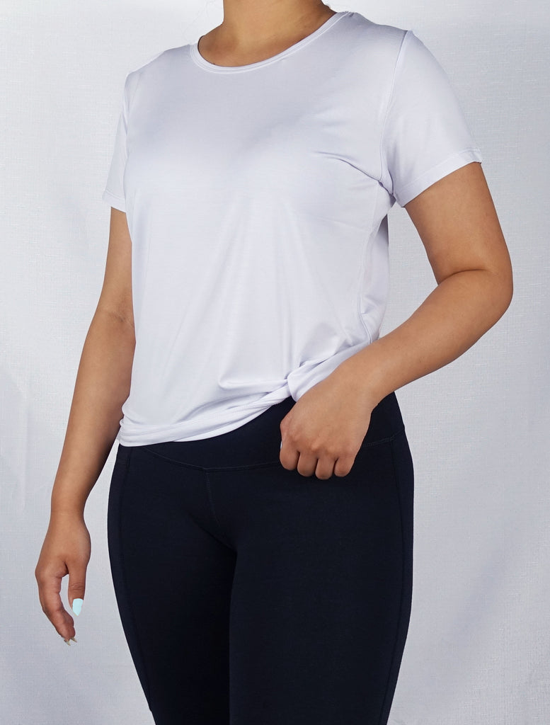 Women wearing a ultra soft white crew neck tee shirt