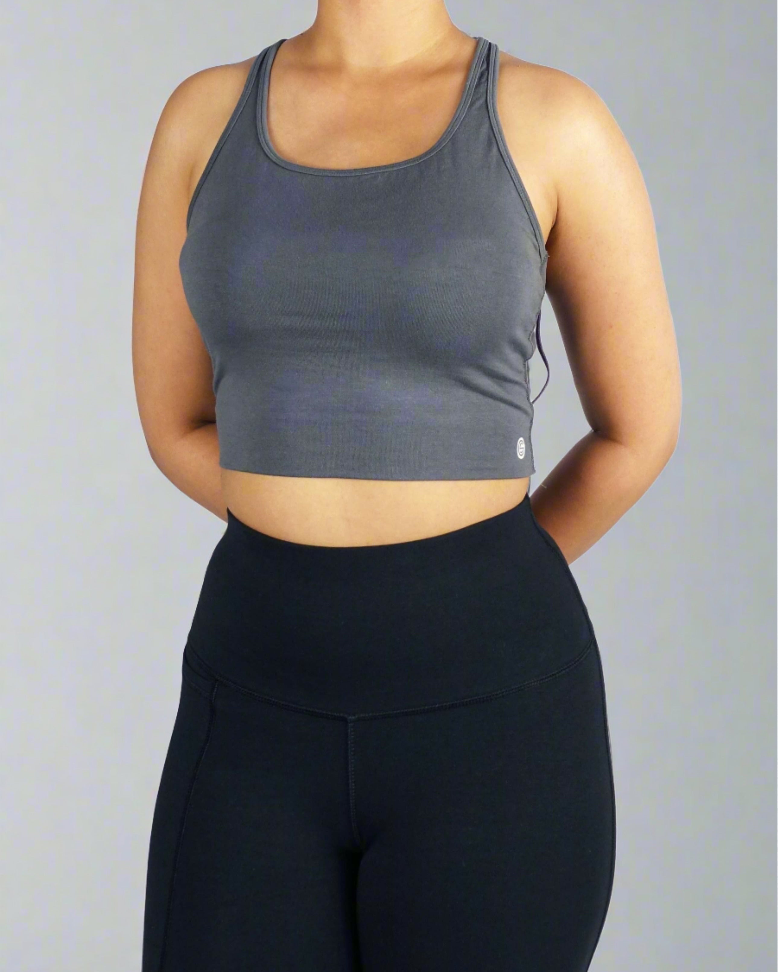 Front view of a women's grey soft crop top