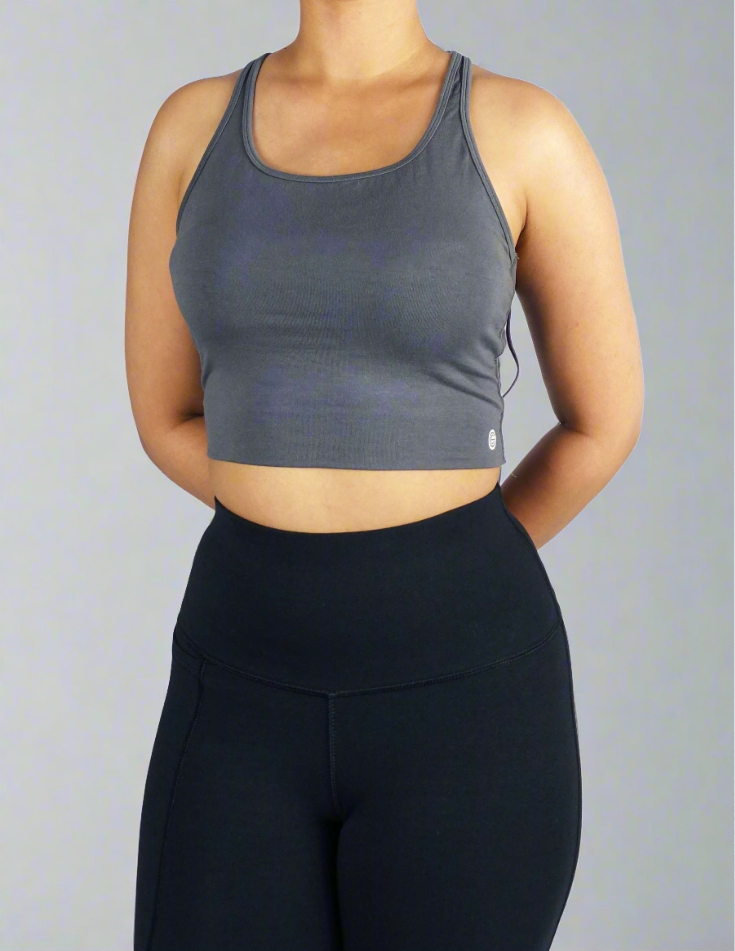 Front view of a women's grey soft crop top