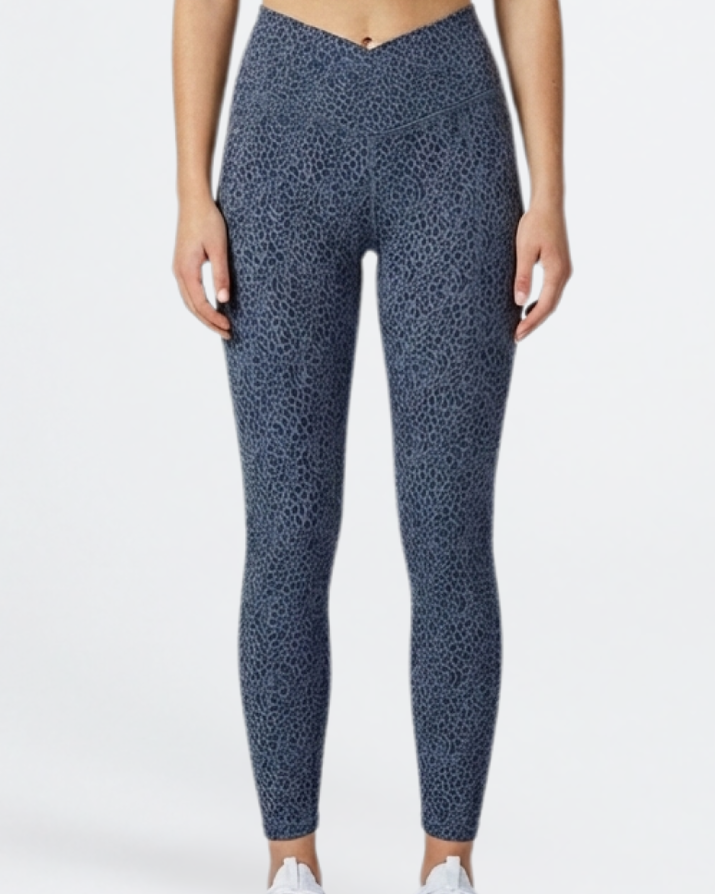 Person wearing blue patterned leggings_Bamboo Super Soft V Cross Waist Phone Pocket Legging Yoga Gym Breathable Hypoallergenic Tights_ on a white background