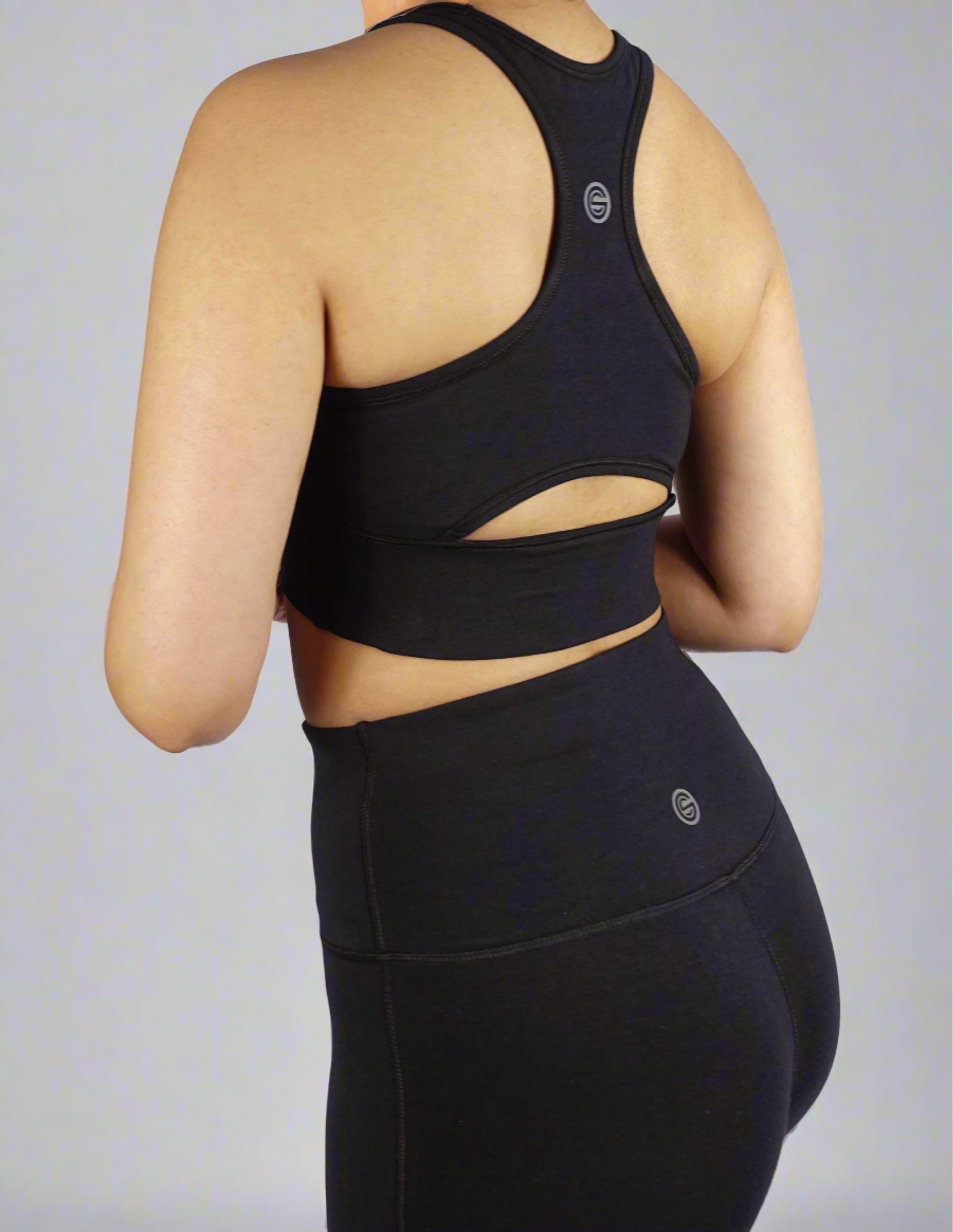 Side view of black sports bra with keyhole cut and side panel stitch for comfort