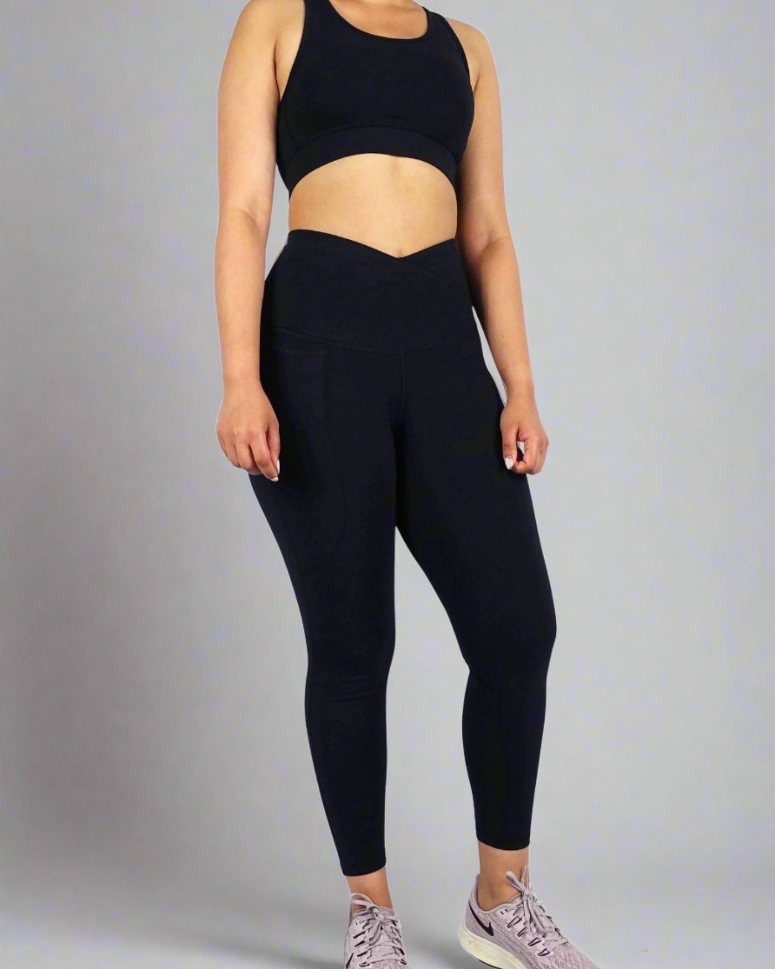 Buttery soft Cross waist leggings in black for gym and yoga