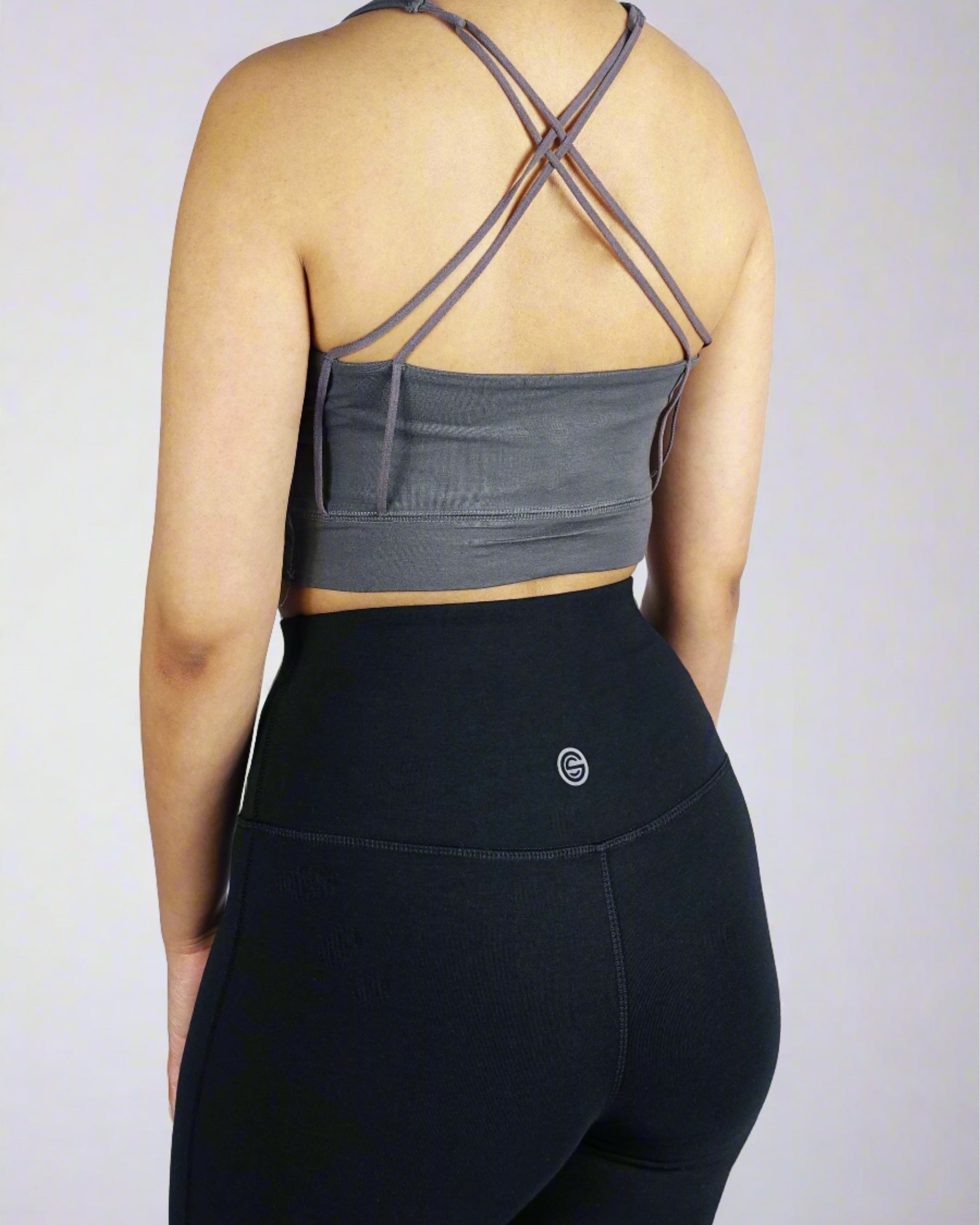 Back view of grey cross strap crop top