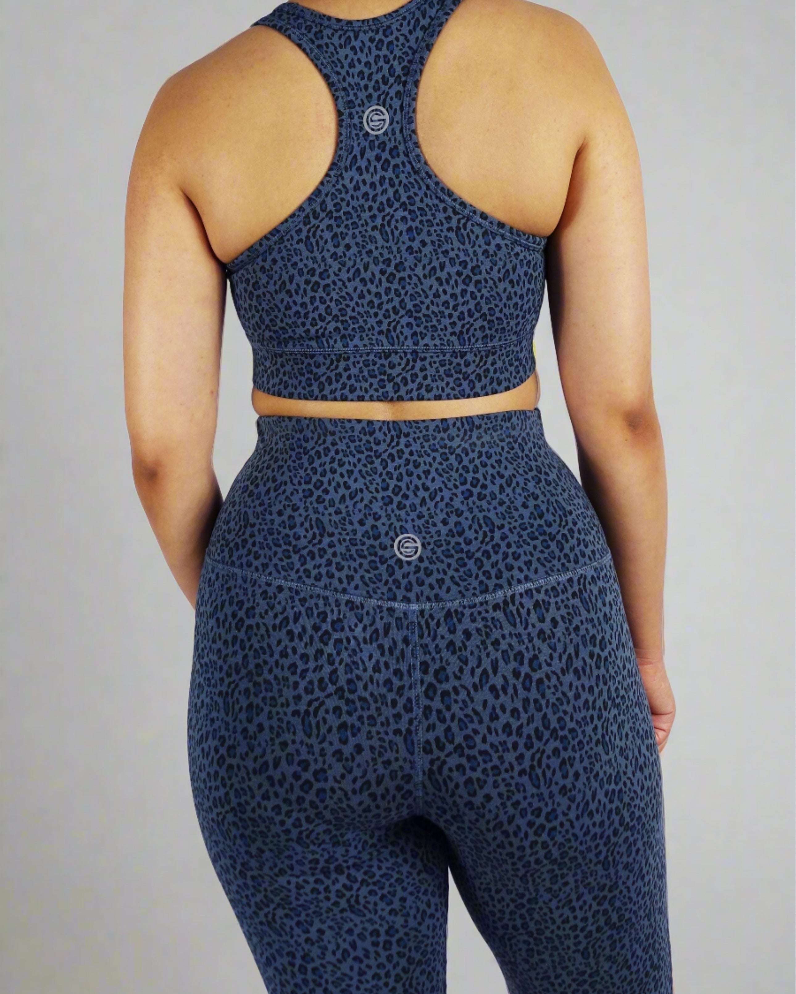 Back view of blue leopard print sports bra