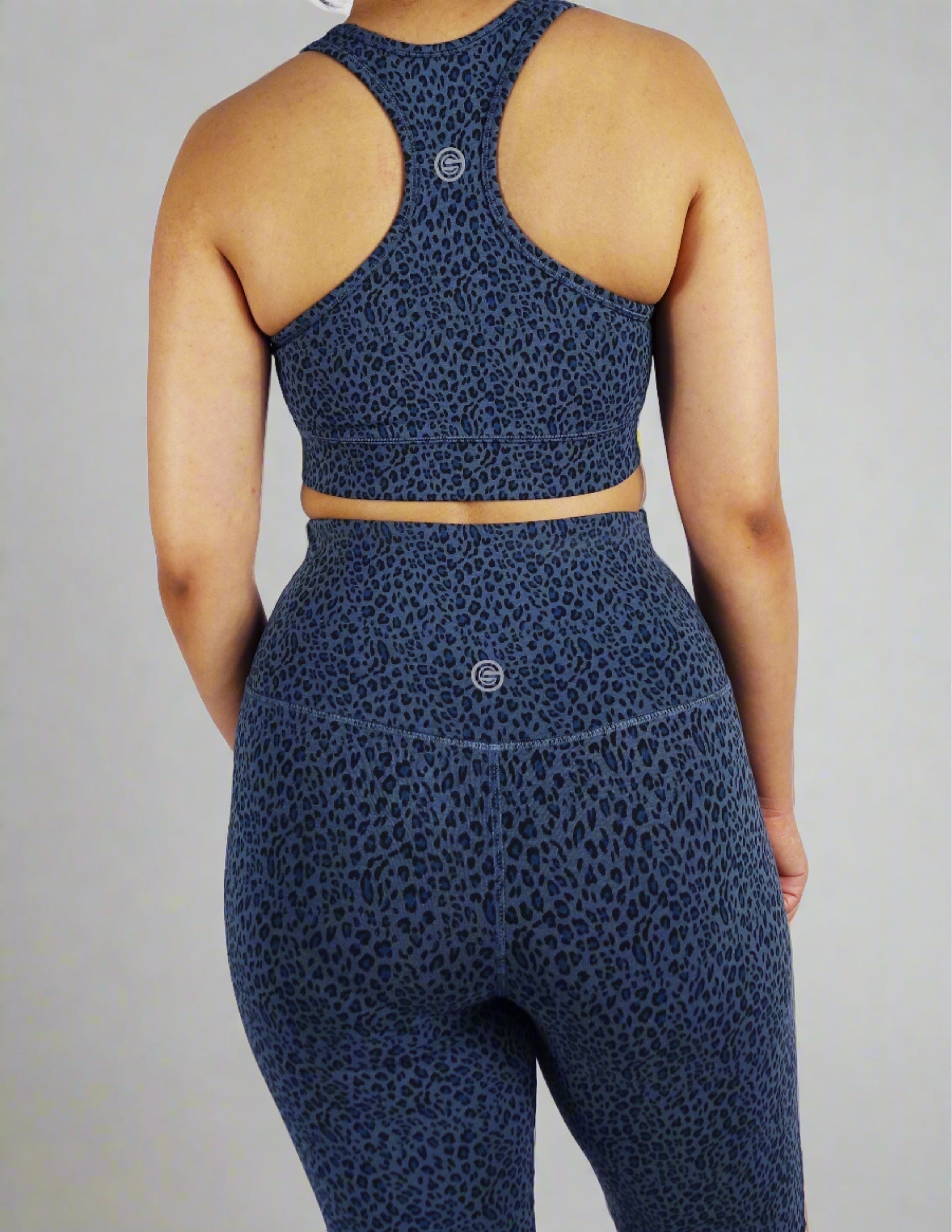 Back view of blue leopard print sports bra