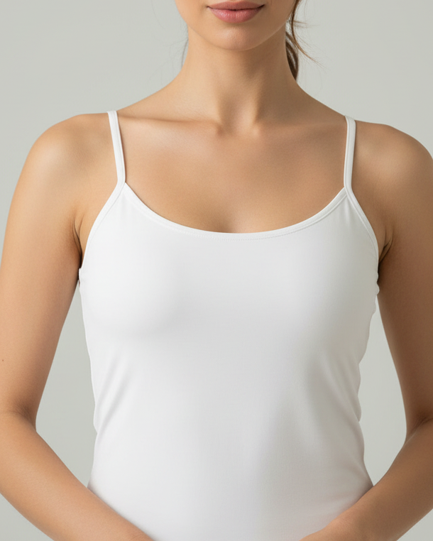 Young woman wearing bamboo camisole top singlet in white