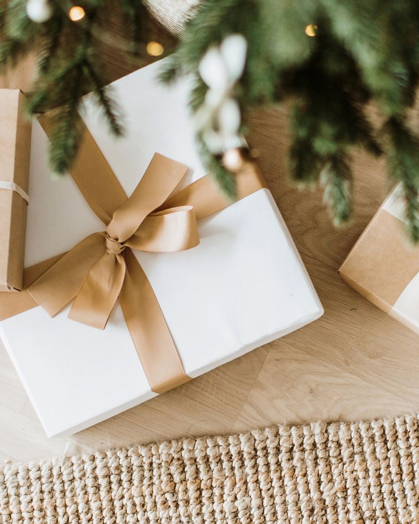 Active by GS Gift Wrap is shown here with kraft paper and ribbon around wrapped gifts.