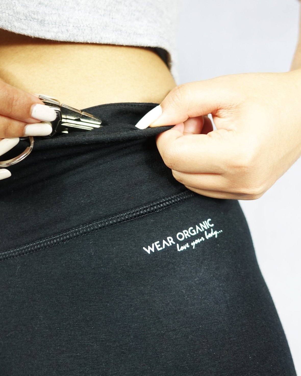 Black crop legging with waistband inside pocket for keys and cards