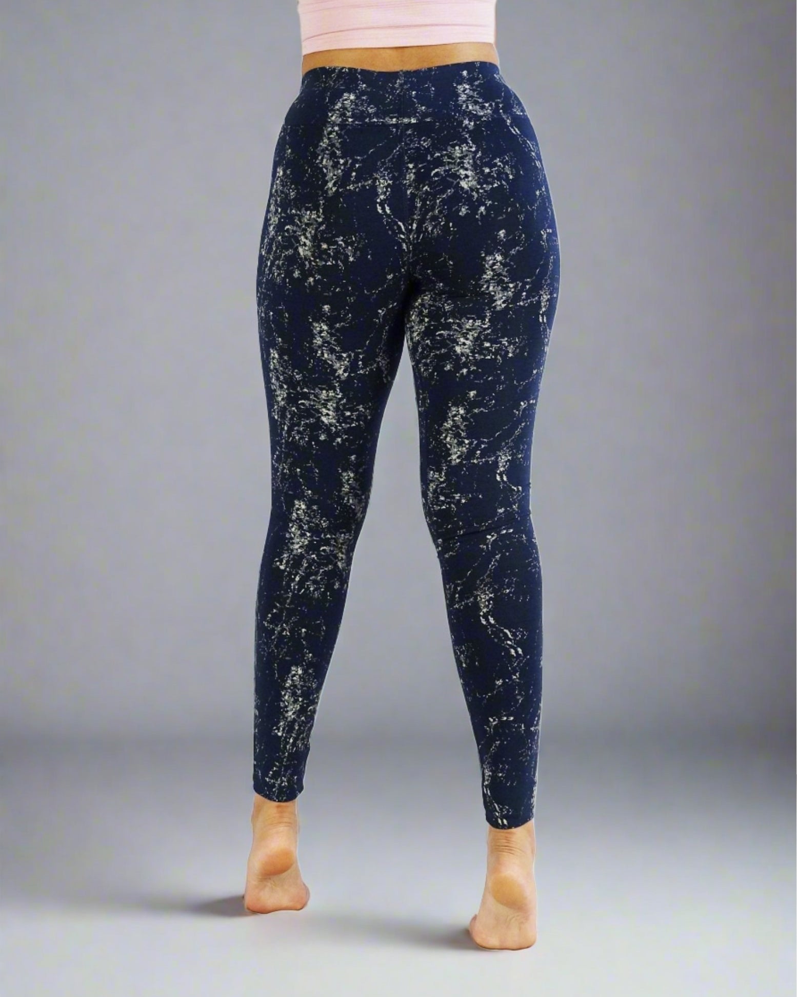Back view of women's blue full length leggings, activewear