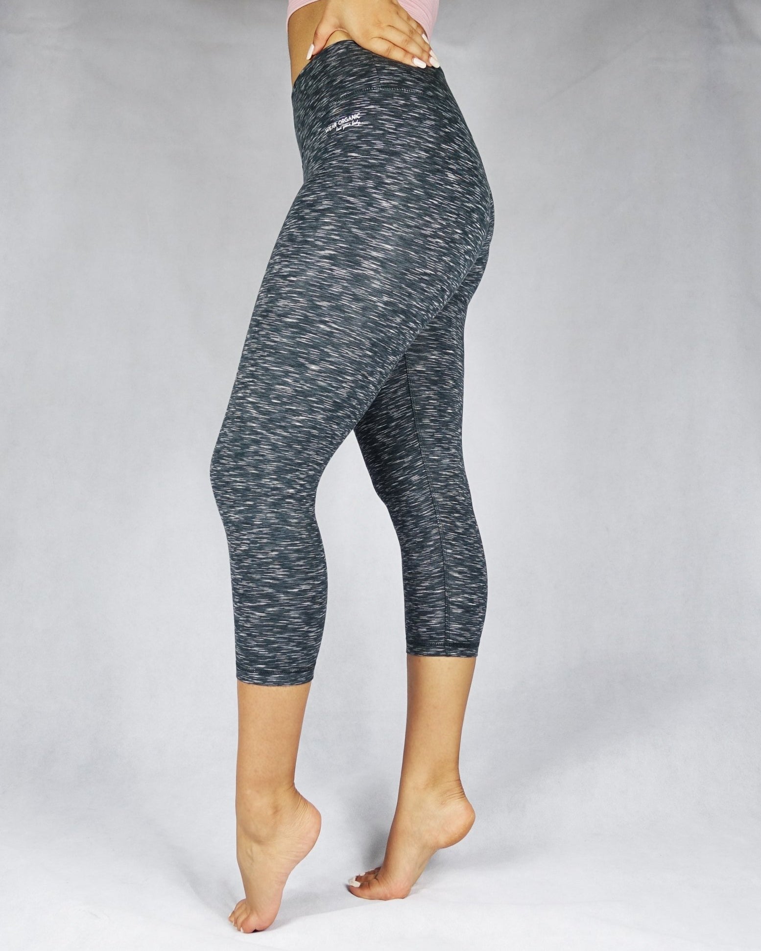 Side view of dark grey crop leggings