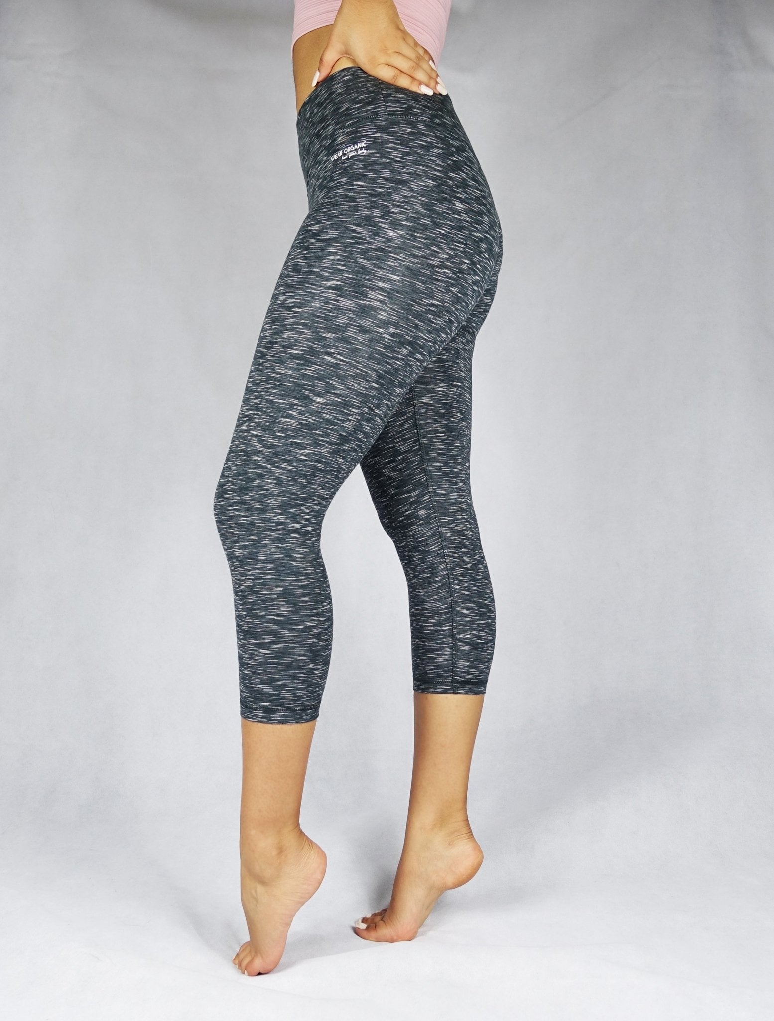 Side view of dark grey crop leggings