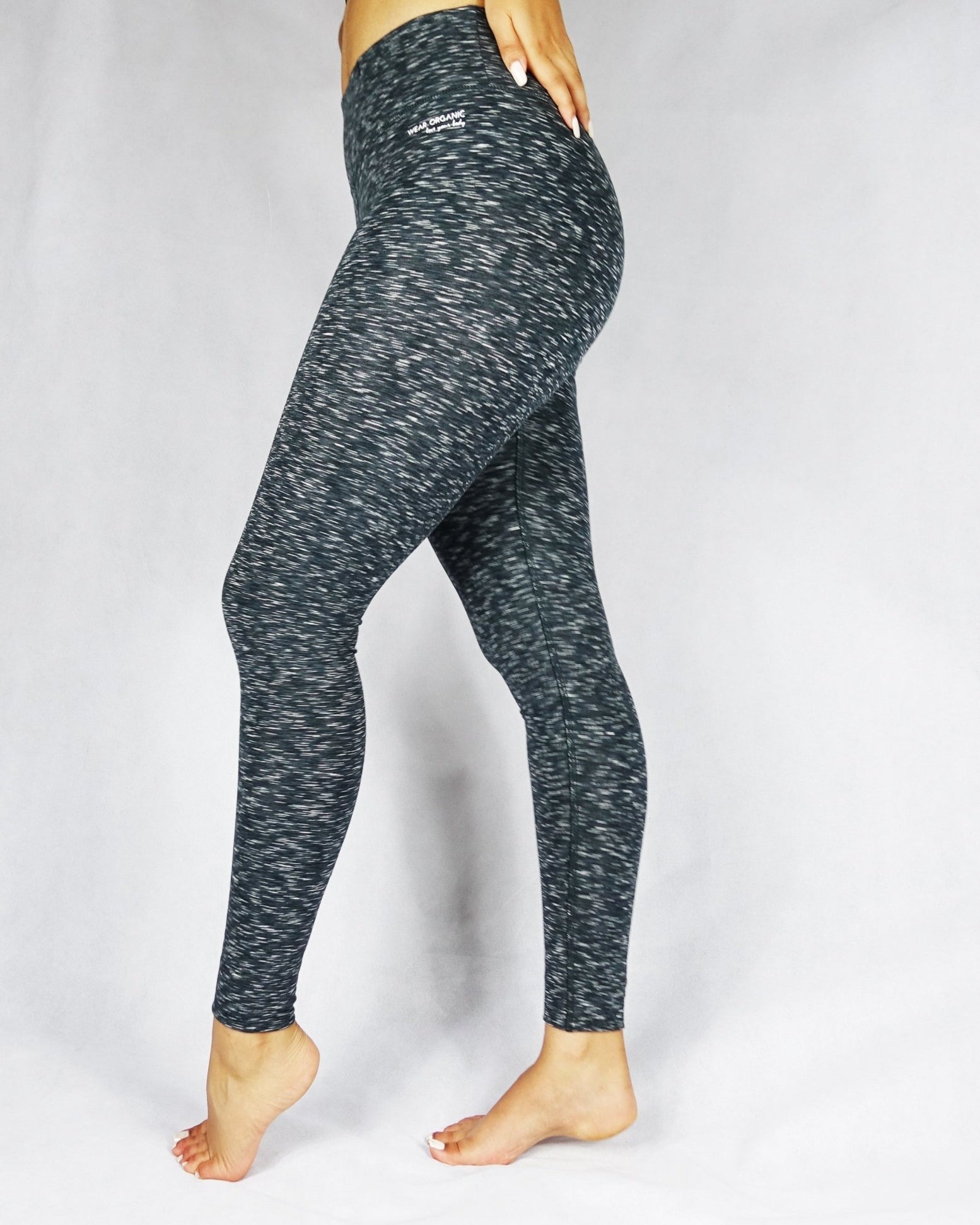 Side view of greyish black full length leggings