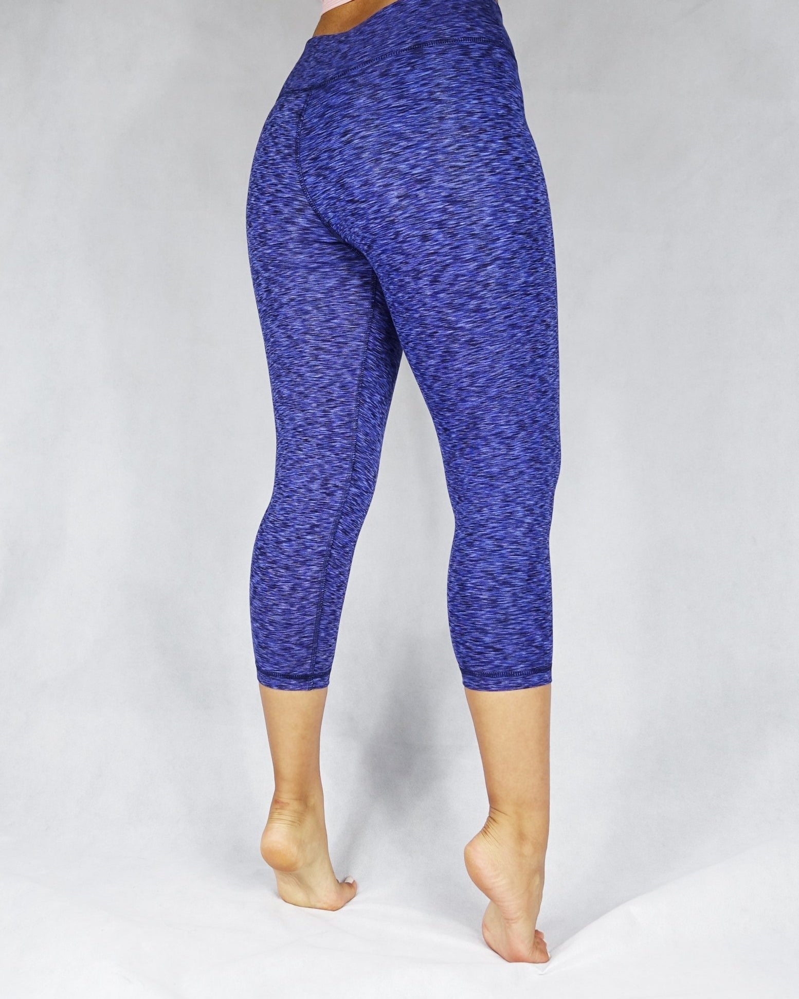 Back side view of blue crop legging