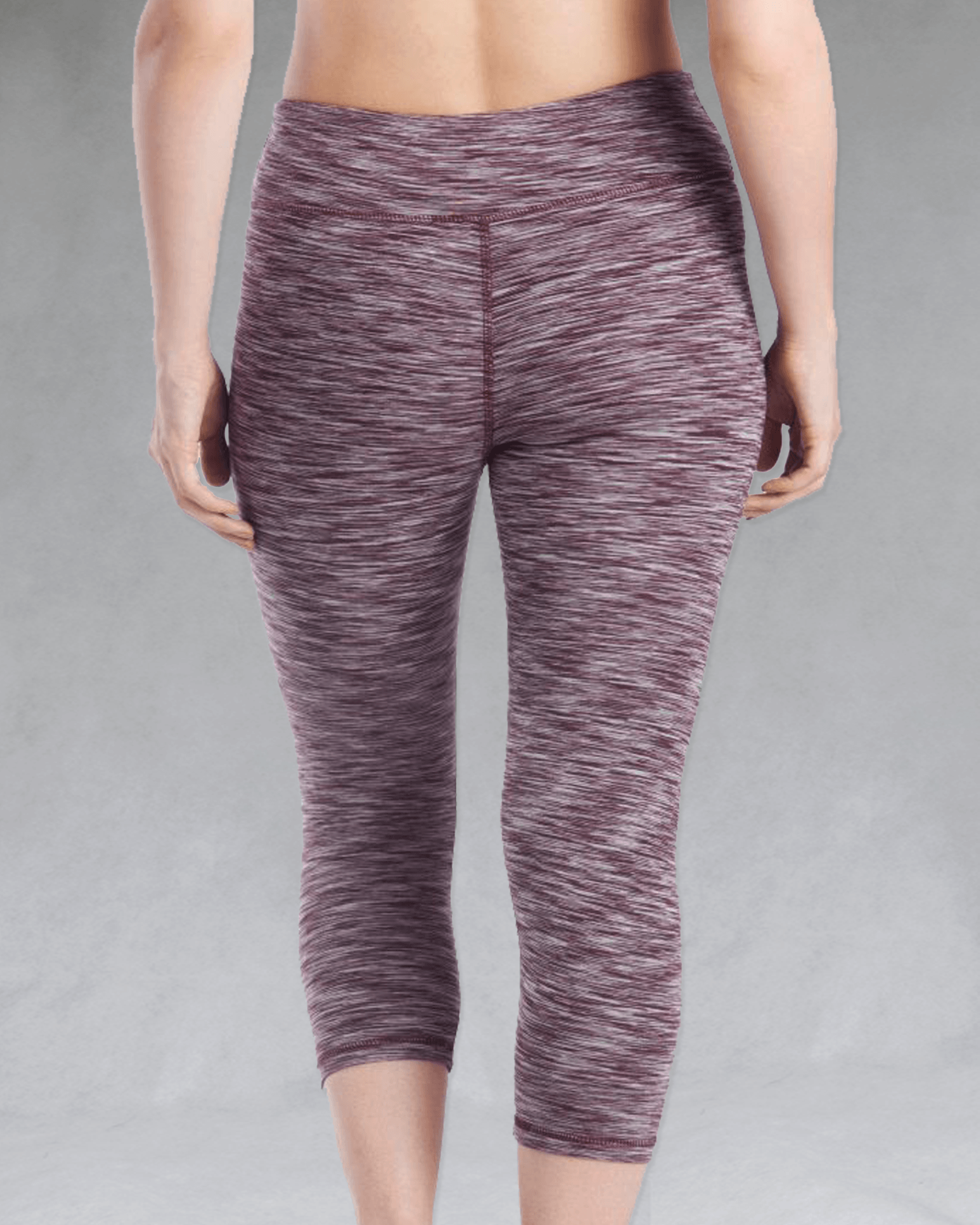 The bamboo crop legging in the Plum Heather print is shown in a back view.