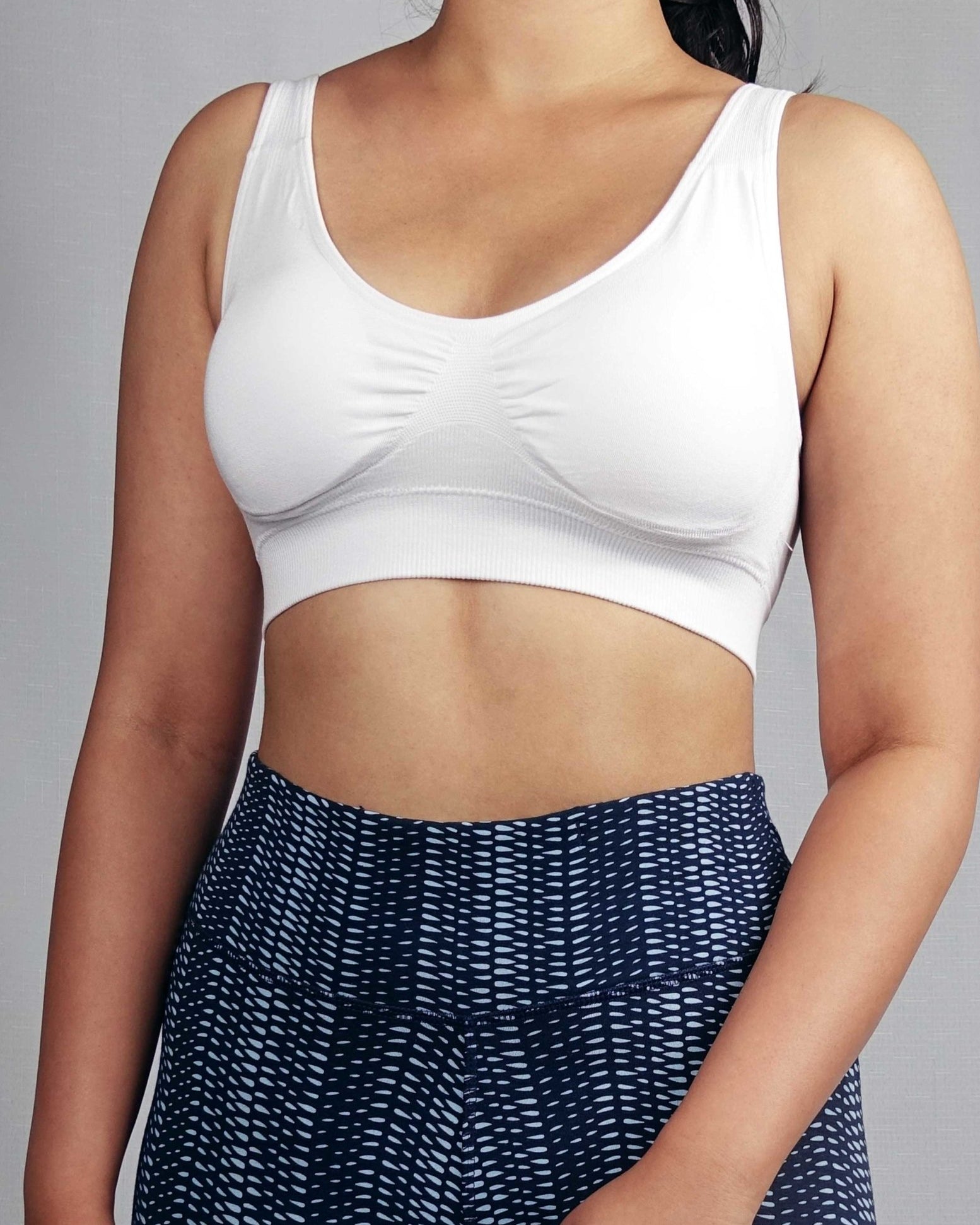 Front view of soft ribbed seamless wire free bra with removable pads, white in colour