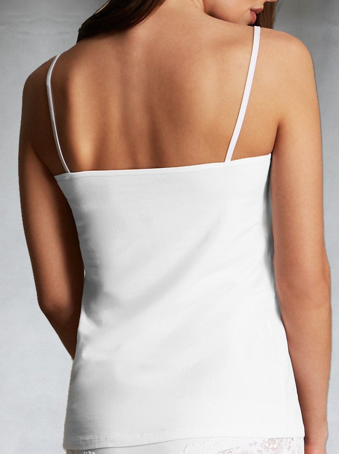 Back view of thin strappy white camisole