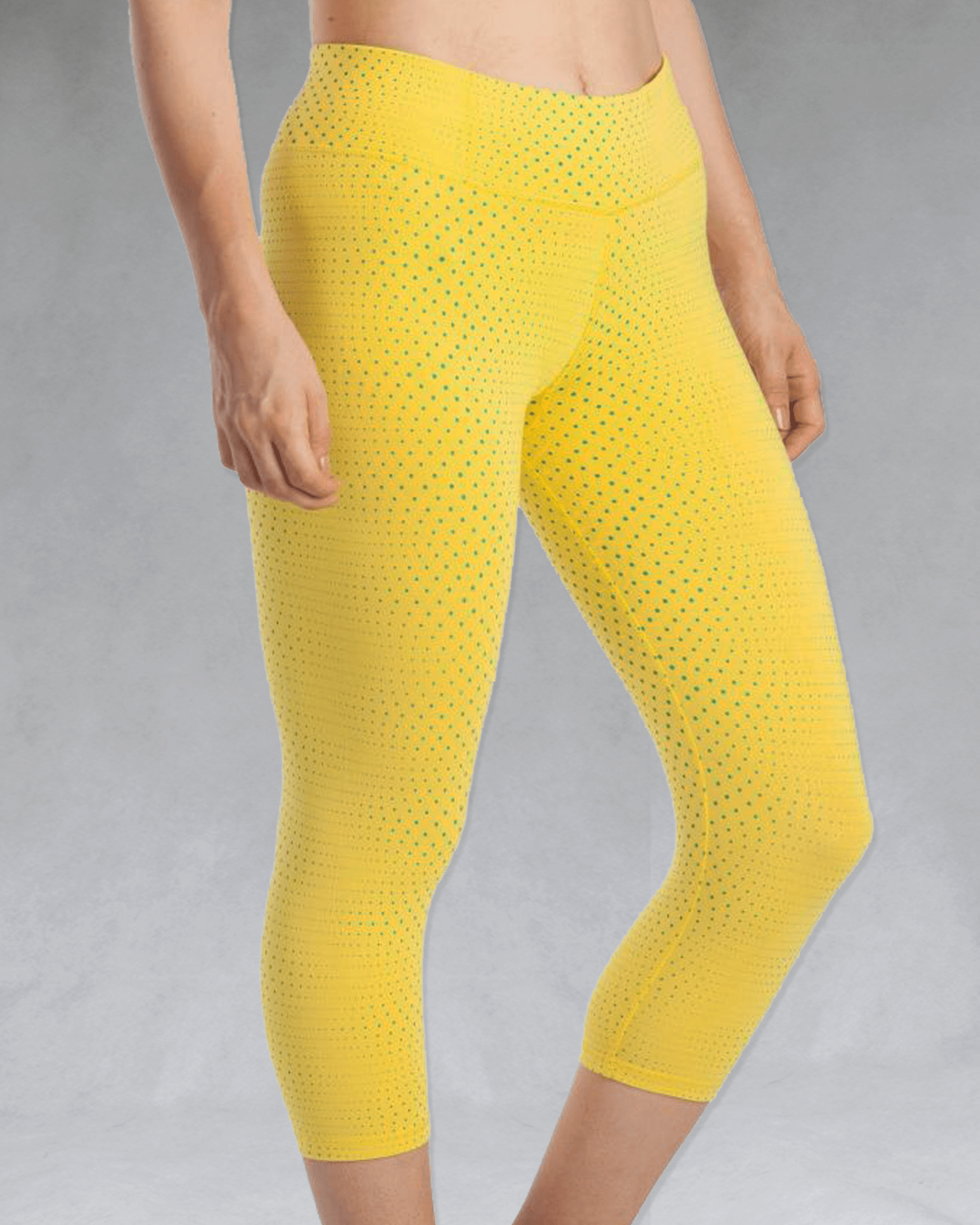 Model wearing sunshine yellow crop leggings