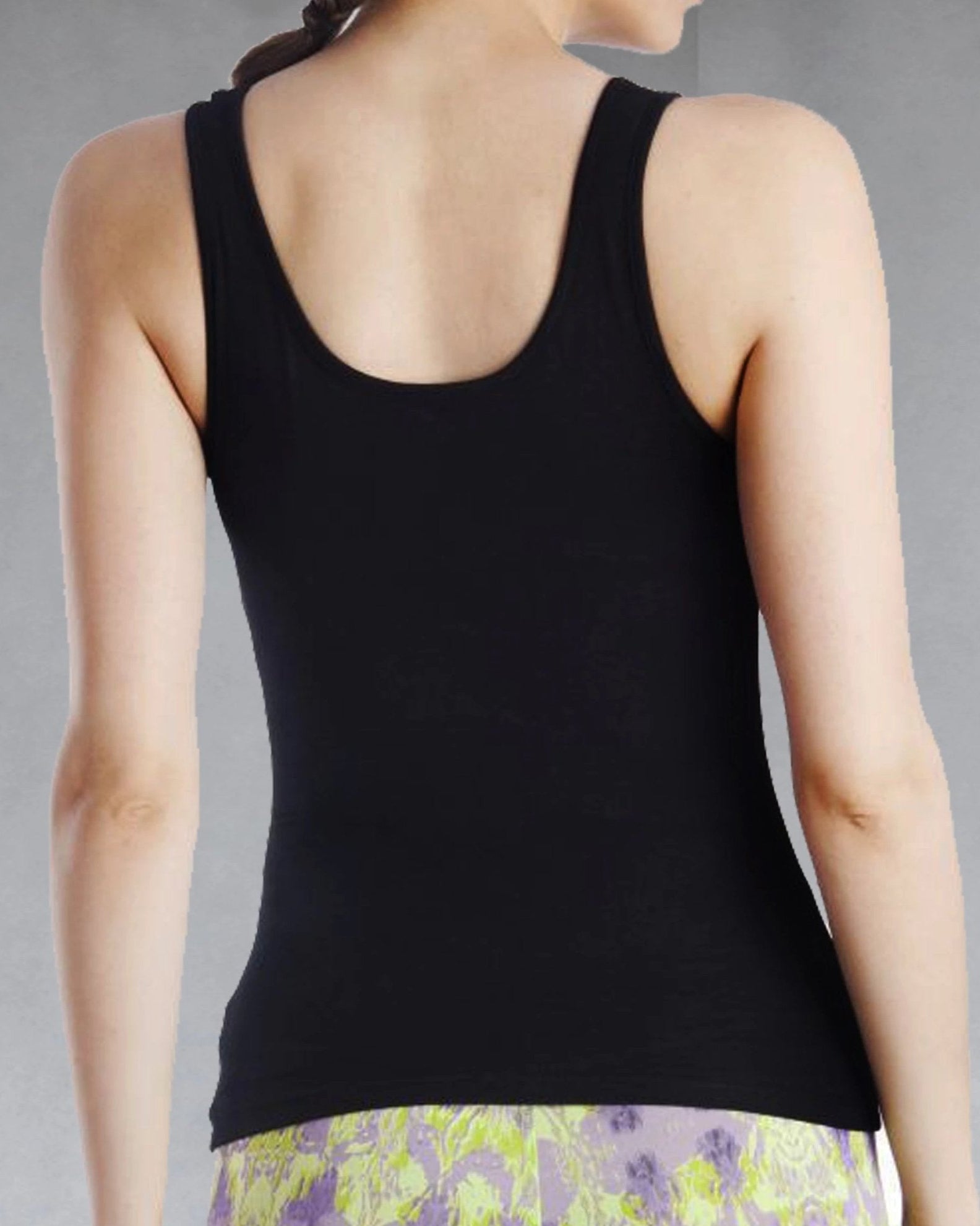 Back view of women's black tank top
