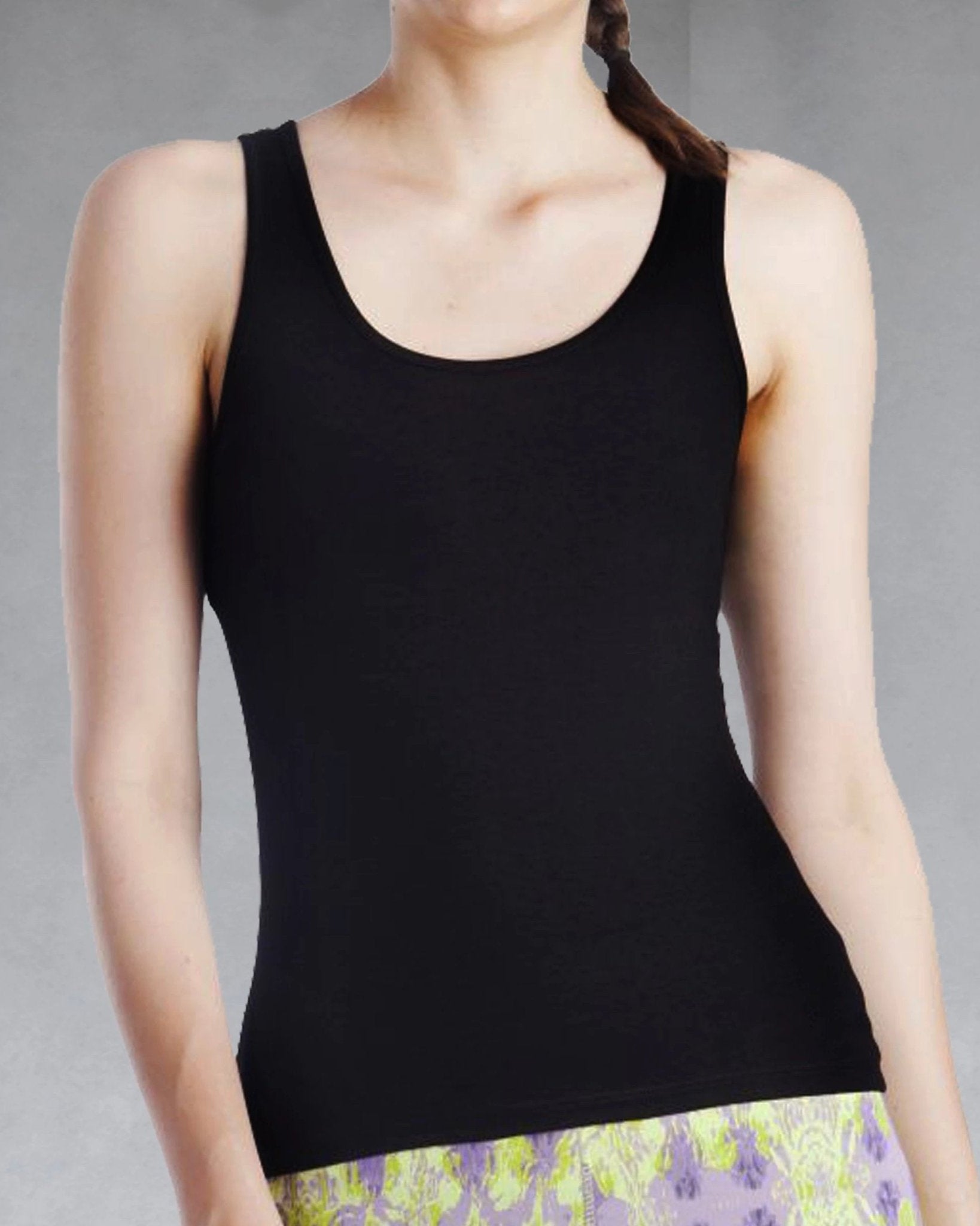 Front view of women's black tank top