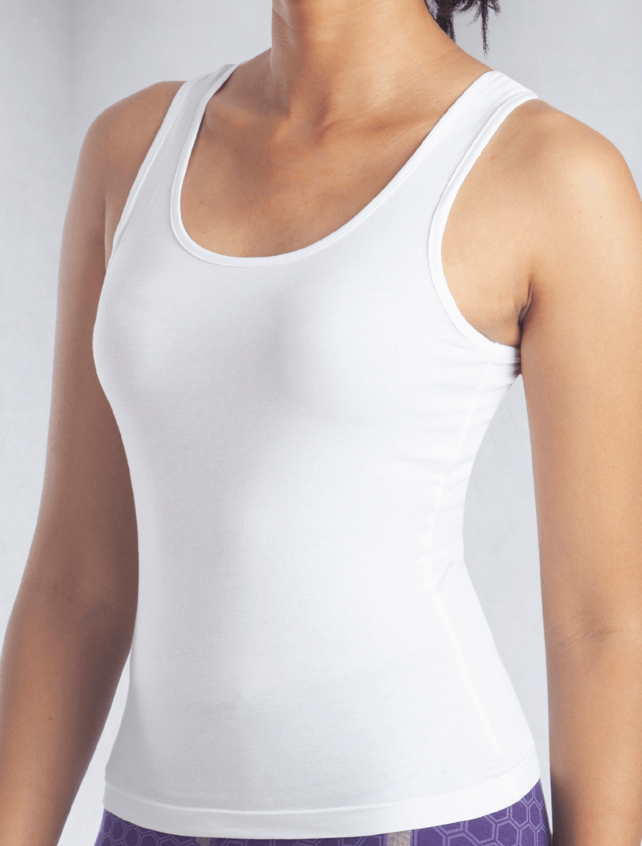 Model wearing women's white tank top