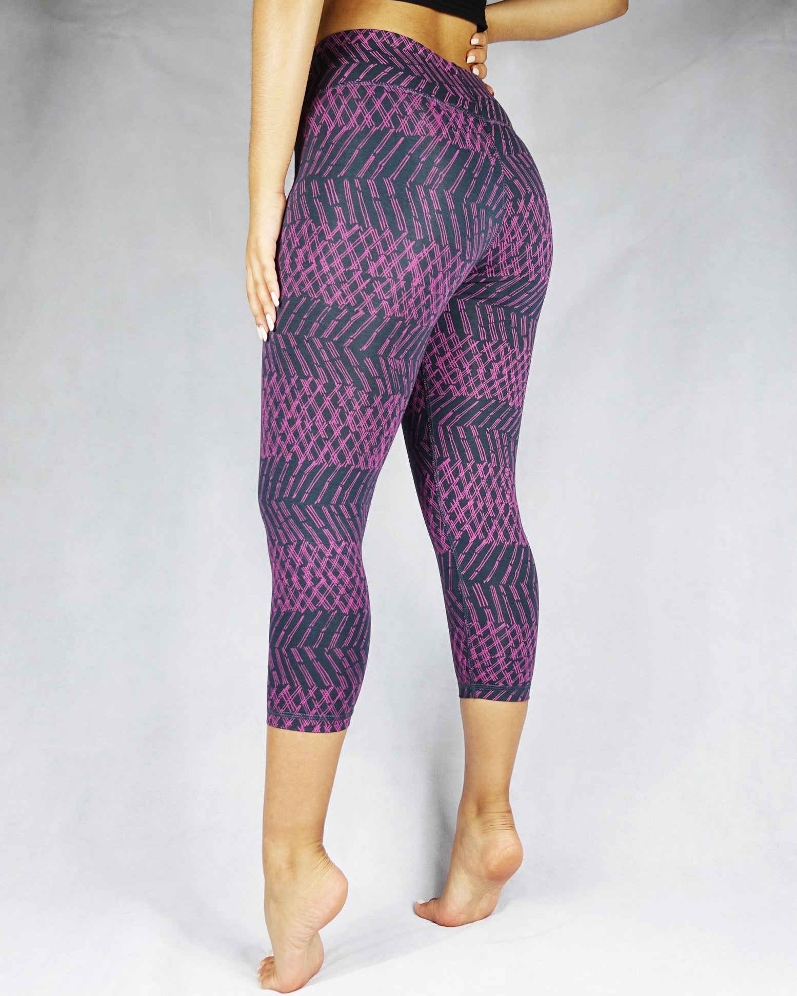 Side view of plum patterned colour crop leggings, activewear