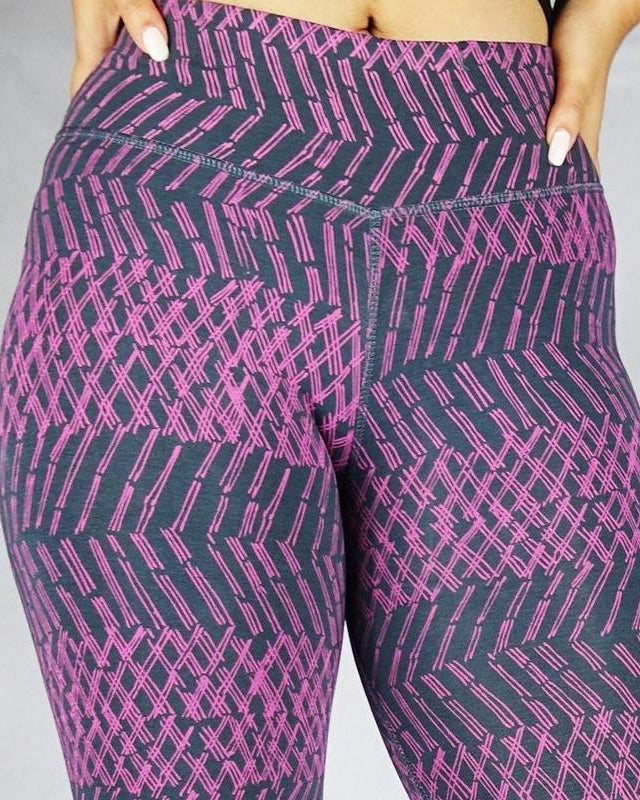 Front close up view of plum patterned colour crop leggings