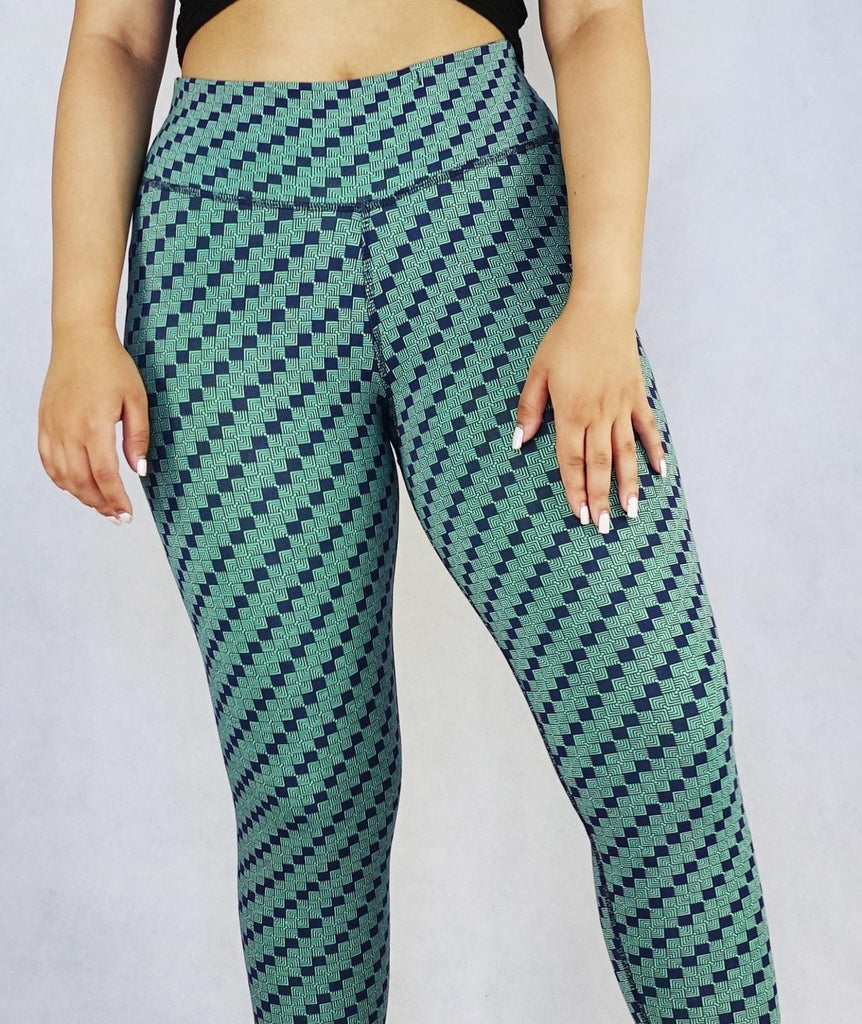 Front view of women wearing green patterned colour full length leggings