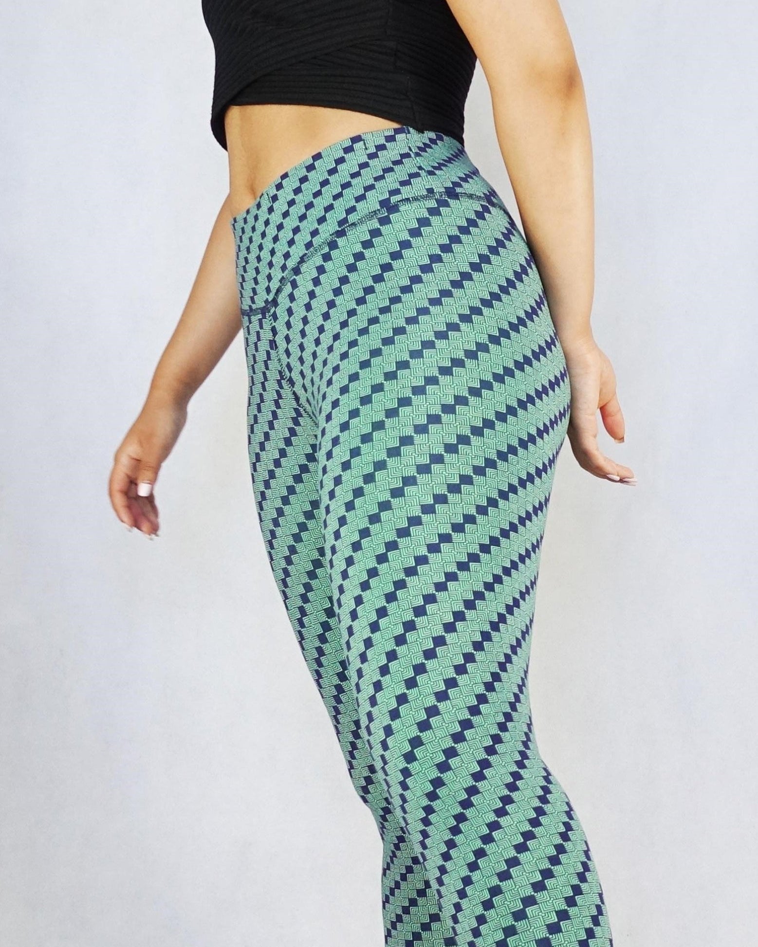 Side view of green patterned colour full length leggings