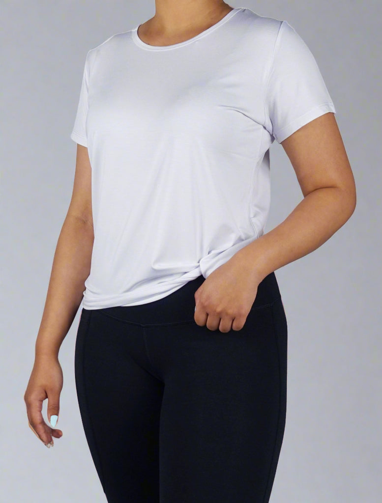 Women wearing a ultra soft white crew neck tee shirt