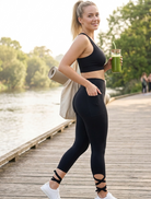 Woman in black pilates tie up legging comfortable & breathable