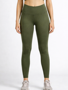 Person wearing green leggings olive-green-workout-leggings-womens-activewear_activebygs on a white background