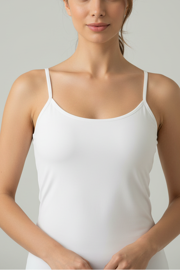 Young woman wearing bamboo camisole top singlet in white