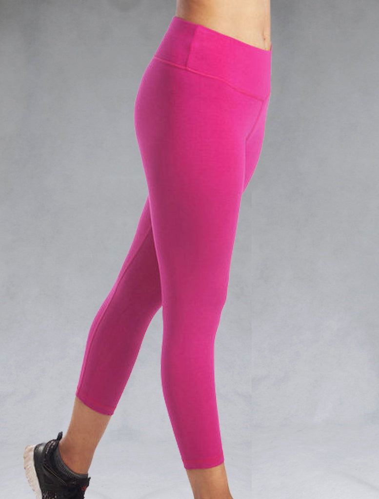 Side view of pink crop leggings