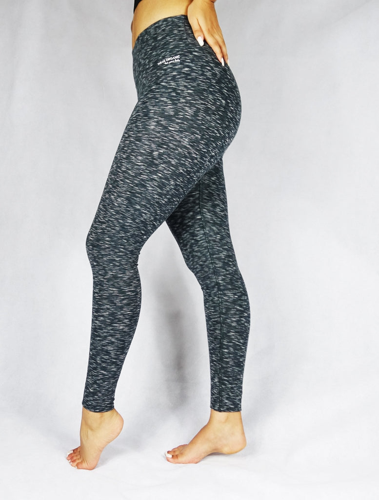 Side view of greyish black full length leggings