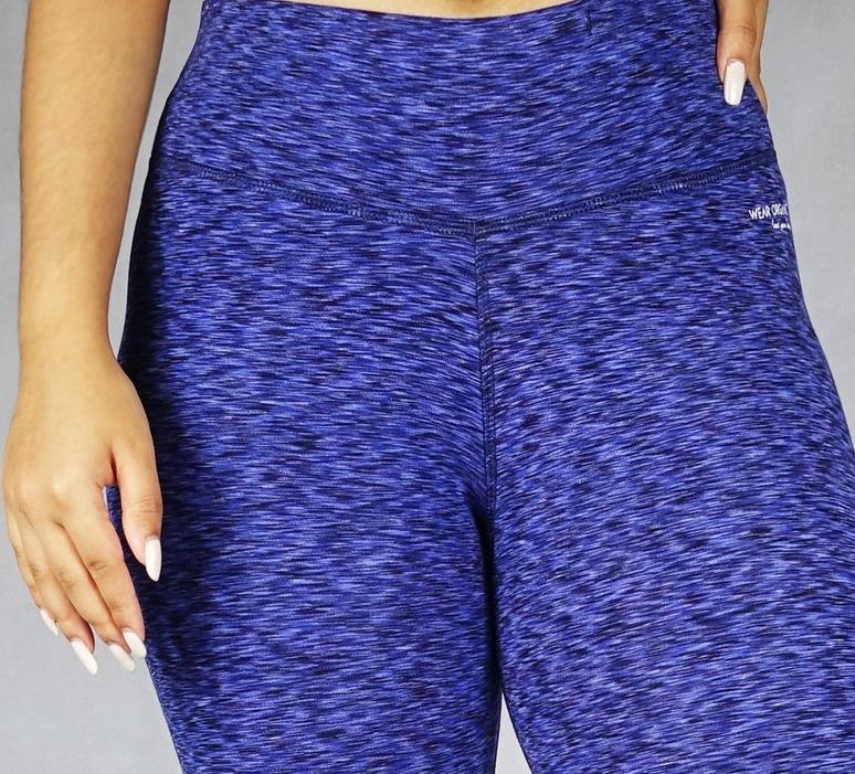 Front close up view of blue crop leggings