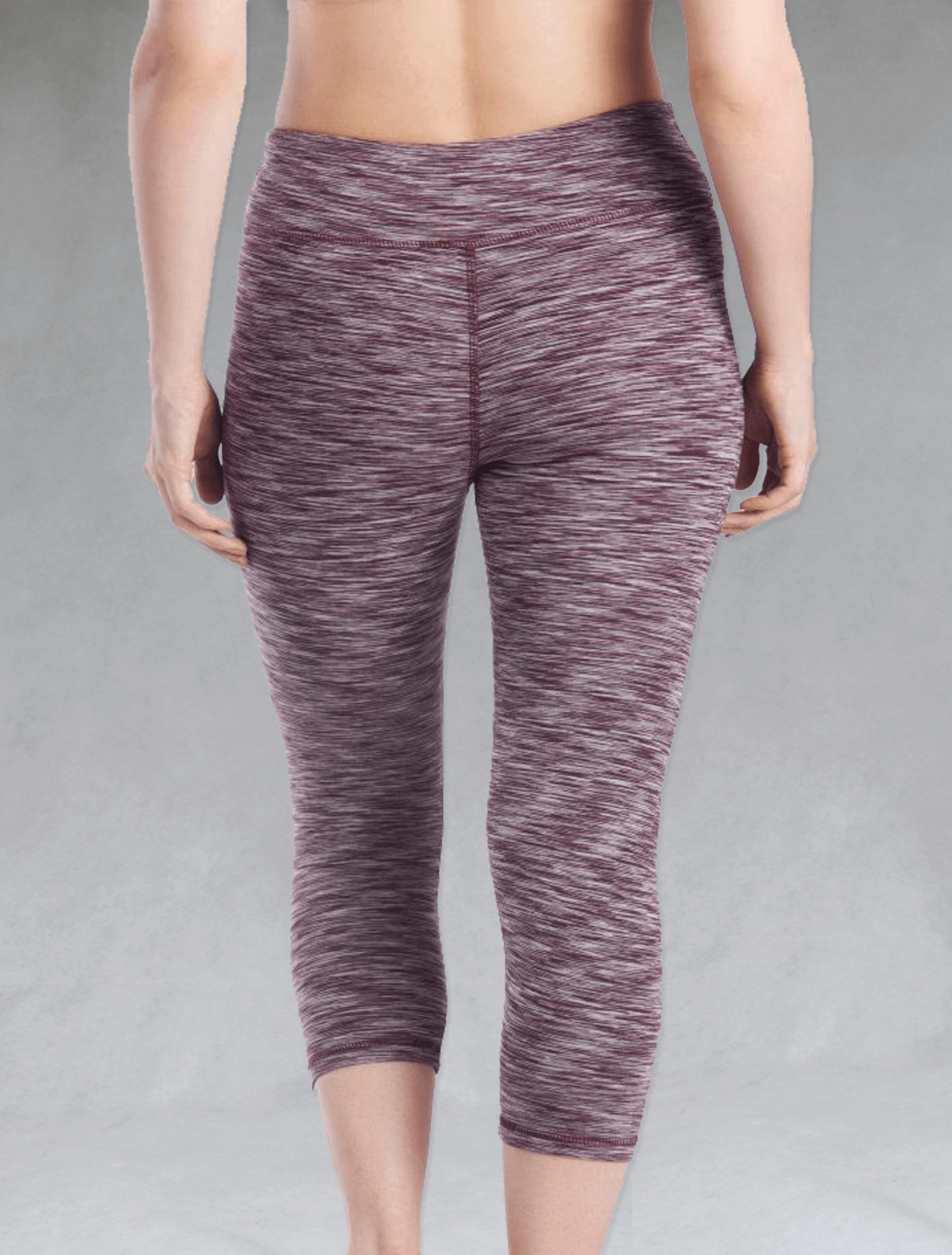 The bamboo crop legging in the Plum Heather print is shown in a back view.