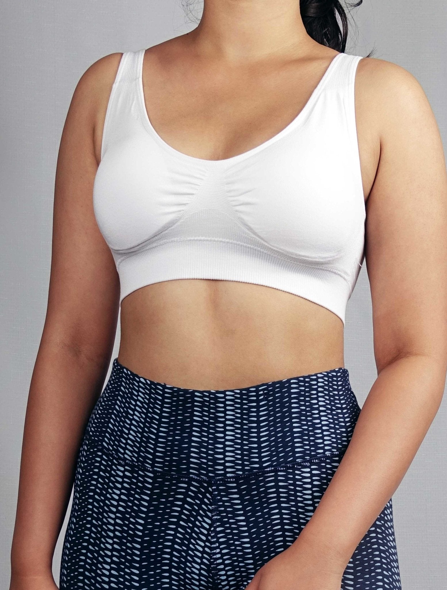 Front view of soft ribbed seamless wire free bra with removable pads, white in colour