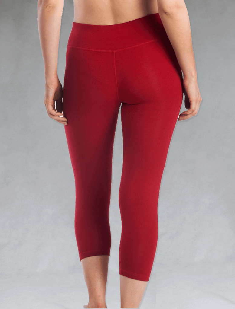 Back view of women's red crop legging