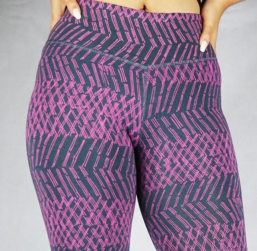 Front close up view of plum patterned colour crop leggings