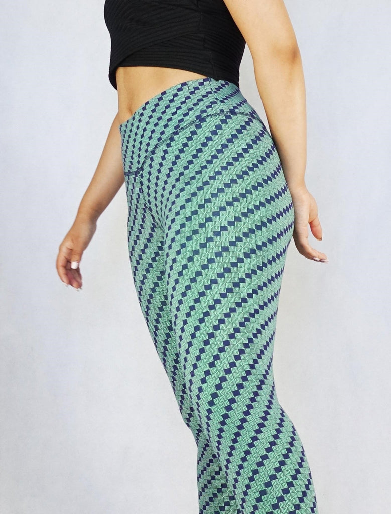 Side view of green patterned colour full length leggings 